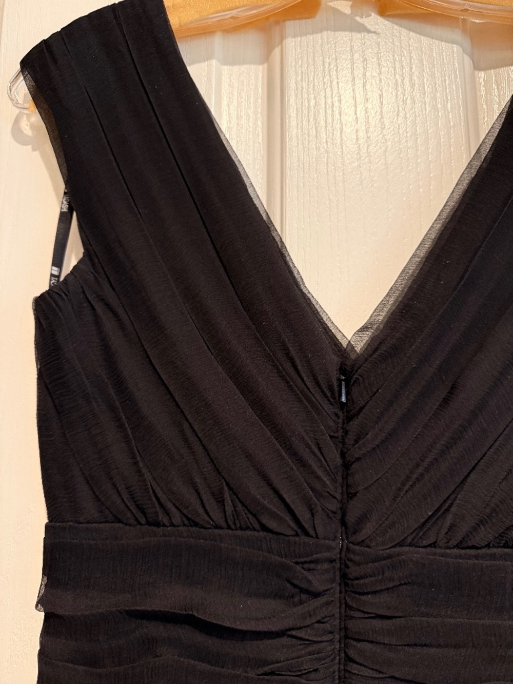 Tadashi black cocktail dress size 4. V neck front and back, ruched pleats.